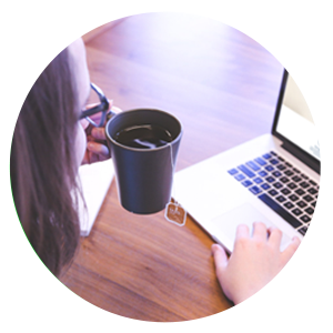 Woman reviewing website on laptop